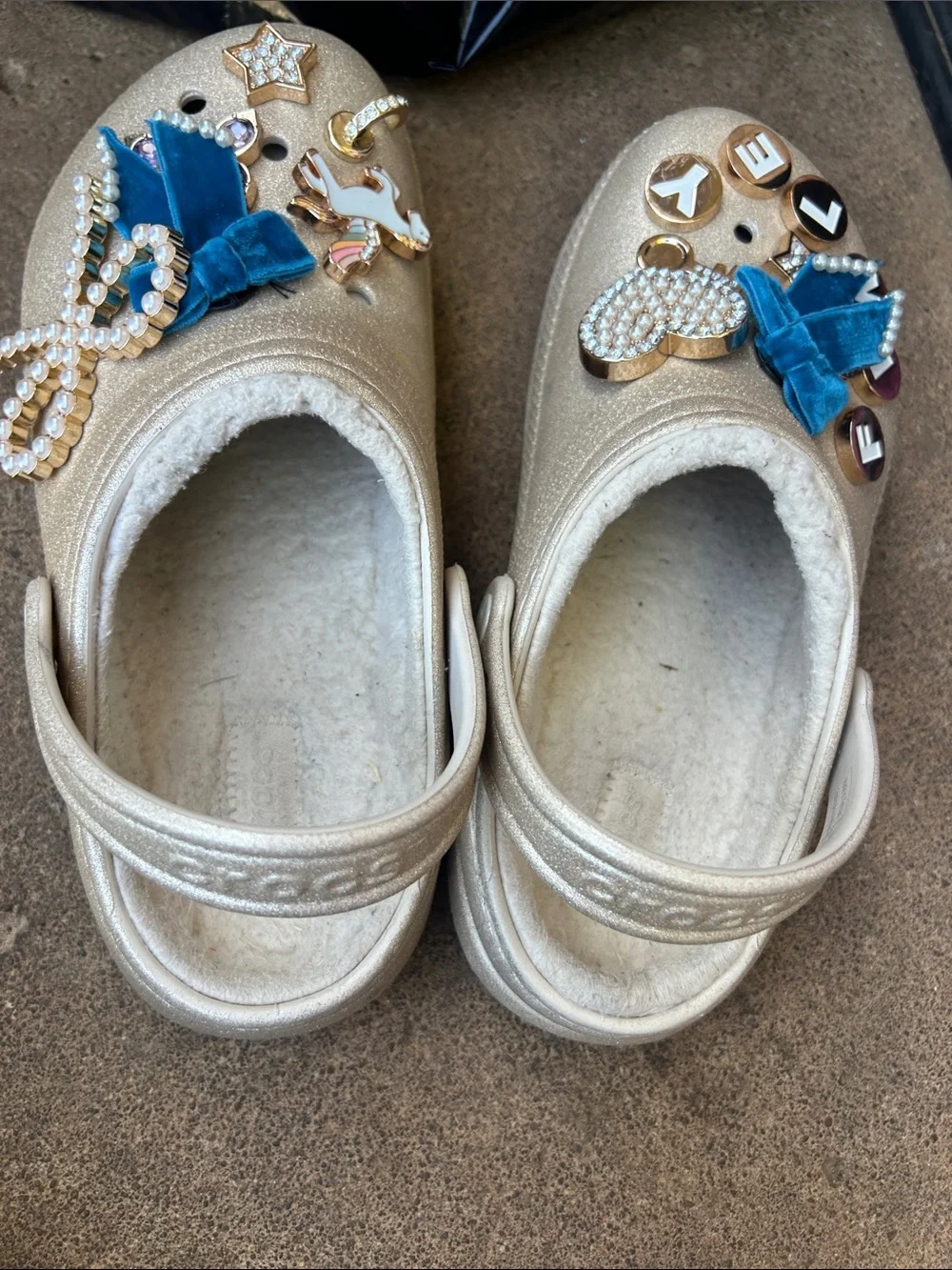 CROCS Kids Gold Glitter Clogs with Blue Velvet Charms